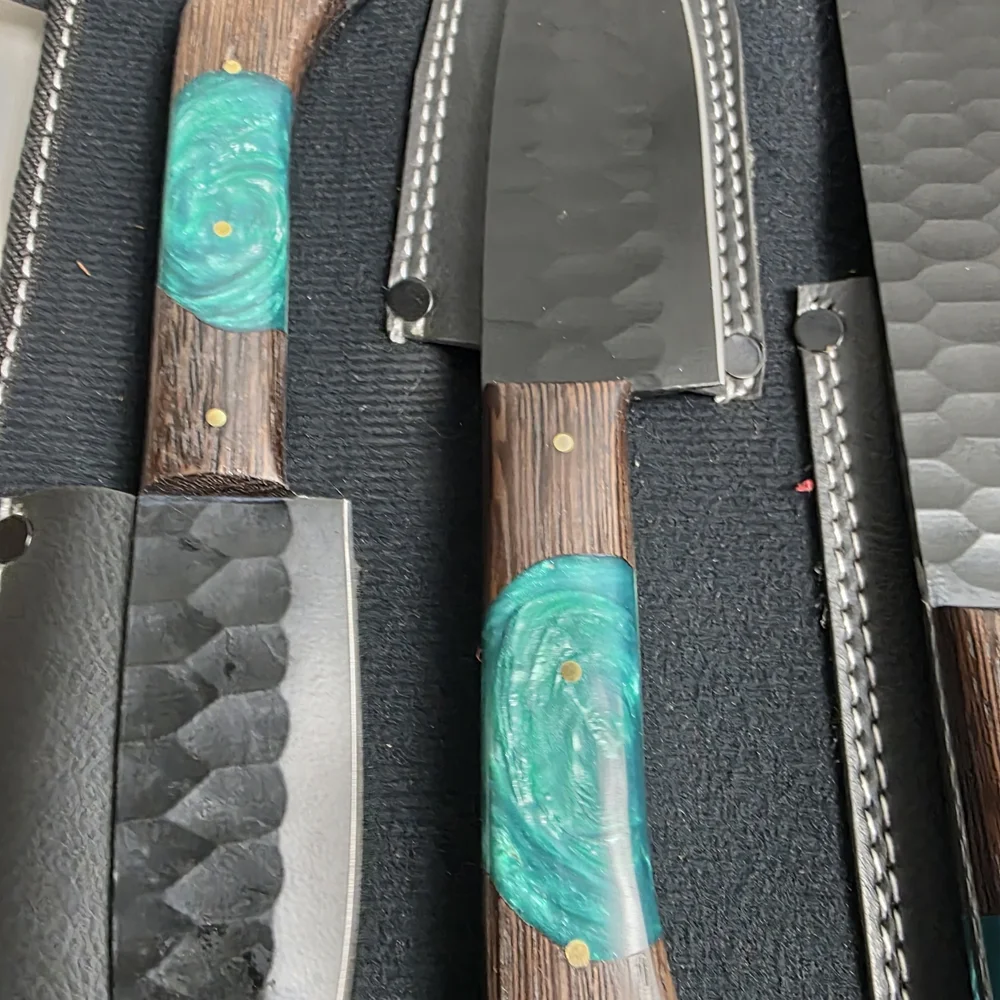 Rust Free Handcrafted J2 Steel Chef Knife Set Wit
Five-piece knife set. Turquois - Picture 8 of 14
